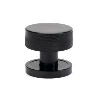 The Knurled Mortice/Rim Knob Set on a Plain Rose in Black Shown Upright on a White Background The Knurled Mortice/Rim Knob Set on a Plain Rose in Black Shown Upright on a White Background