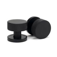 The Knurled Mortice/Rim Knob Set on a Plain Rose in Matt Black Shown Upright and on its Side The Knurled Mortice/Rim Knob Set on a Plain Rose in Matt Black Shown Upright and on its Side