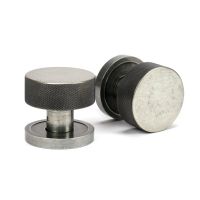 The Knurled Mortice/Rim Knob Set on a Plain Rose in Pewter Shown Upright and on its Side The Knurled Mortice/Rim Knob Set on a Plain Rose in Pewter Shown Upright and on its Side