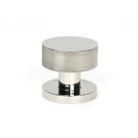 The Knurled Mortice/Rim Knob Set on a Plain Rose in Polished Stainless Steel Shown Upright on a White Background The Knurled Mortice/Rim Knob Set on a Plain Rose in Polished Stainless Steel Shown Upright on a White Background