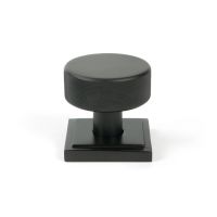 The Knurled Mortice/Rim Knob Set on a Square Rose in Aged Bronze Shown Upright The Knurled Mortice/Rim Knob Set on a Square Rose in Aged Bronze Shown Upright