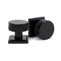 The Knurled Mortice/Rim Knob Set on a Square Rose in Black Shown Upright and on its Side The Knurled Mortice/Rim Knob Set on a Square Rose in Black Shown Upright and on its Side