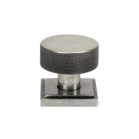 The Knurled Mortice/Rim Knob Set on a Square Rose in Pewter Shown Upright on a White Background The Knurled Mortice/Rim Knob Set on a Square Rose in Pewter Shown Upright on a White Background