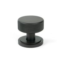 The Knurled Mortice/Rim Knob Set on an Art Deco Rose in Aged Bronze Shown Upright on a White Background The Knurled Mortice/Rim Knob Set on an Art Deco Rose in Aged Bronze Shown Upright on a White Background