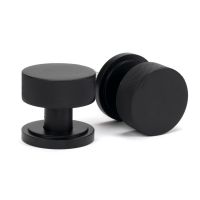 The Knurled Mortice/Rim Knob Set on an Art Deco Rose in Matt Black Shown Upright and on its Side The Knurled Mortice/Rim Knob Set on an Art Deco Rose in Matt Black Shown Upright and on its Side