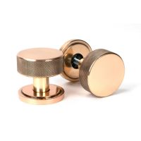 The Knurled Mortice/Rim Knob Set on an Art Deco Rose in Polished Bronze Shown Upright and on its Side The Knurled Mortice/Rim Knob Set on an Art Deco Rose in Polished Bronze Shown Upright and on its Side