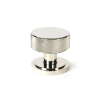 The Knurled Mortice/Rim Knob Set on an Art Deco Rose in Polished Nickel Shown Upright on a White Background The Knurled Mortice/Rim Knob Set on an Art Deco Rose in Polished Nickel Shown Upright on a White Background