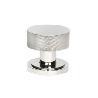 The Knurled Mortice/Rim Knob Set on an Art Deco Rose in Polished Stainless Steel Shown Upright on a White Background The Knurled Mortice/Rim Knob Set on an Art Deco Rose in Polished Stainless Steel Shown Upright on a White Background