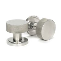 The Knurled Mortice/Rim Knob Set on an Art Deco Rose in Satin Stainless Steel Shown Upright and on its Side The Knurled Mortice/Rim Knob Set on an Art Deco Rose in Satin Stainless Steel Shown Upright and on its Side