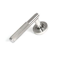 The Knurled Sprung Handle Set on a Beehive Rose in Polished Stainless Steel Shown at an Angle on a White Background