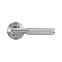 The Knurled Sprung Handle Set on a Beehive Rose in Polished Stainless Steel Shown from the Front on a White Background