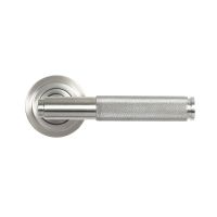 The Knurled Sprung Handle Set on an Art Deco Rose in Satin Stainless Steel Shown from the Front on a White Background