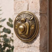 The “Lambeth Hall” Antique Brass Round Lion Bell Pushon the Front of a Snone Brick House Next to a Front Door - Digital Illustration The “Lambeth Hall” Antique Brass Round Lion Bell Pushon the Front of a Snone Brick House Next to a Front Door - Digital Illustration