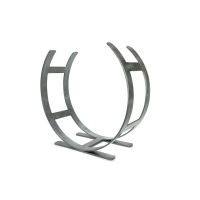 The Large Curved Fireside Log Holder in Pewter Shown from an Angle on a White Background