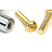 The Large Half Knurled Cabinet Pull Handle in Polished Chrome Showing a Close up Image of the Supplied Fittings