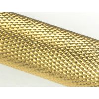 The Large Knurled Cabinet Pull Handle in Polished Brass Showing a Close-Up of the Diamond Knurled Pattern Grip