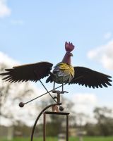 The Large Metal Rooster Rocking Garden Spike Close up of the Rooster Sculpture