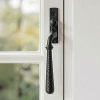 The Left Handed Dark Aged Bronze Hammered Espag Window Handle Mounted on a Traditional White Window Frame in a Country Home - Digital Illustration The Left Handed Dark Aged Bronze Hammered Espag Window Handle Mounted on a Traditional White Window Frame in a Country Home - Digital Illustration
