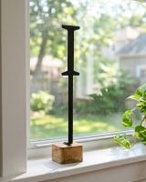 The Letter "I" Monograph Metal & Wood Letter Display Ornament on a Sunny Windowsill in a Modern Home Interior - Digital Illustration 