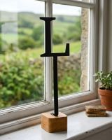 The Letter "L" Monograph Metal & Wood Letter Display Ornament in a Countryside Home Kitchen Window - Digital Illustration 