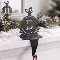 The Letter D Stocking Holder on a Christmas Decorated Mantelpiece - Digital Illustration The Letter D Stocking Holder on a Christmas Decorated Mantelpiece - Digital Illustration