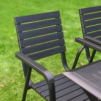 The Linea 6-Seater Outdoor Garden Dining Set in Black Showing a Close up of the Panelled Chair Backrest