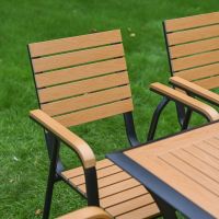 The Linea 6-Seater Outdoor Garden Dining Set in Teak Showing the Panelled Chair Backrests