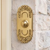 The "Mackintosh" Polished Brass Ornate Bell Pushes on a Cream Coloured Stone Wall on a Country Home - Digital Illustration The "Mackintosh" Polished Brass Ornate Bell Pushes on a Cream Coloured Stone Wall on a Country Home - Digital Illustration