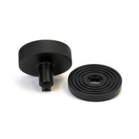 The Matt Black Knurled Centre Door Knob on a Beehive Rose Displayed in Separate Sections on a White Background The Matt Black Knurled Centre Door Knob on a Beehive Rose Displayed in Separate Sections on a White Background