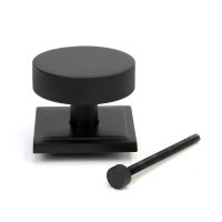 The Matt Black Knurled Centre Door Knob on a Square Rose with Bolt Fitting 