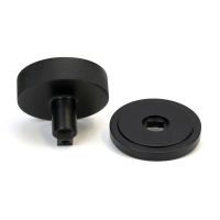The Matt Black Knurled Centre Door Knob on an Art Deco Rose Displayed in Separate Sections on a White Background The Matt Black Knurled Centre Door Knob on an Art Deco Rose Displayed in Separate Sections on a White Background