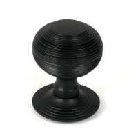 The Matt Black Traditional Beehive Centre Door Knob Shown Upright on a White Background The Matt Black Traditional Beehive Centre Door Knob Shown Upright on a White Background