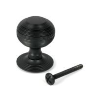 The Matt Black Traditional Beehive Centre Door Knob Shown Upright with Bolt The Matt Black Traditional Beehive Centre Door Knob Shown Upright with Bolt