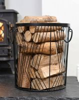 The Medium Art Deco Wire Log Basket next to a Traditional Log Burner Stove - Digital Illustration The Medium Art Deco Wire Log Basket next to a Traditional Log Burner Stove - Digital Illustration