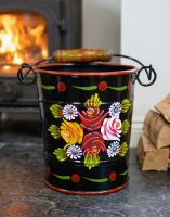 The Medium Black Narrowboat Hand Painted Bucket Perfect for Kindling next to a Log Burner Stove - Digital Illustration