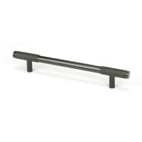 The Medium Half Knurled Cabinet Pull Handle in Aged Bronze Shown Upright on a White Background The Medium Half Knurled Cabinet Pull Handle in Aged Bronze Shown Upright on a White Background