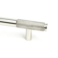 The Medium Half Knurled Cabinet Pull Handle in Polished Stainless Steel Looking Close up of the End of the Knurled Handle The Medium Half Knurled Cabinet Pull Handle in Polished Stainless Steel Looking Close up of the End of the Knurled Handle