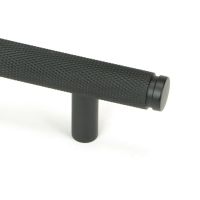 The Medium Knurled Cabinet Pull Handle in Matt Black Looking Close up of the End of the Knurled Handle