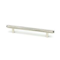 The Medium Knurled Cabinet Pull Handle in Polished Nickel Shown Upright on a White Background The Medium Knurled Cabinet Pull Handle in Polished Nickel Shown Upright on a White Background