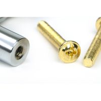 The Medium Knurled Cabinet Pull Handle in Satin Chrome Showing a Close up of the Included Fittings
