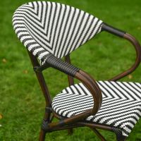 The Monaco Parisian Bistro Set in Black and White Showing a Close up of the Bamboo Effect Armrest