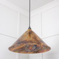 The Nidus Pendant Light in a Burnished Finish Shown From a Low Angle