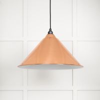 The Nidus Pendant Light in Copper and Glossy White on a White Panelled Background with Light off