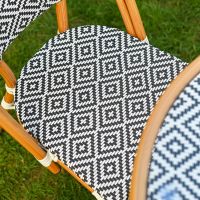 The Orbis Diamond 4-Seater Bistro Dining Set in Black & White Showing the Patterned Seat