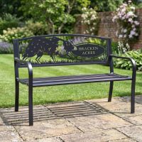 The Personalised Border Collie Iron & Steel Park Bench in Black on a Flagstone Patio in a Stunning Walled Garden - Digital Illustration