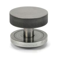 The Pewter Knurled Centre Door Knob on a Plain Rose Shown Upright on a White Background 