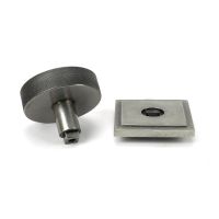 The Pewter Knurled Centre Door Knob on a Square Rose Displayed in Separate Sections on a White Background The Pewter Knurled Centre Door Knob on a Square Rose Displayed in Separate Sections on a White Background