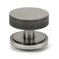 The Pewter Knurled Centre Door Knob on an Art Deco Rose on a White Background Shown Upright The Pewter Knurled Centre Door Knob on an Art Deco Rose on a White Background Shown Upright