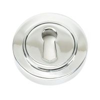 The Plain Concealed Standard Keyhole Escutcheon - Polished Chrome on a White Background The Plain Concealed Standard Keyhole Escutcheon - Polished Chrome on a White Background