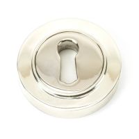 The Plain Concealed Standard Keyhole Escutcheon - Polished Nickel on a White Background 